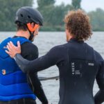 Alex Maes getting student on the water