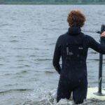 Alex Maes entering water to join the session